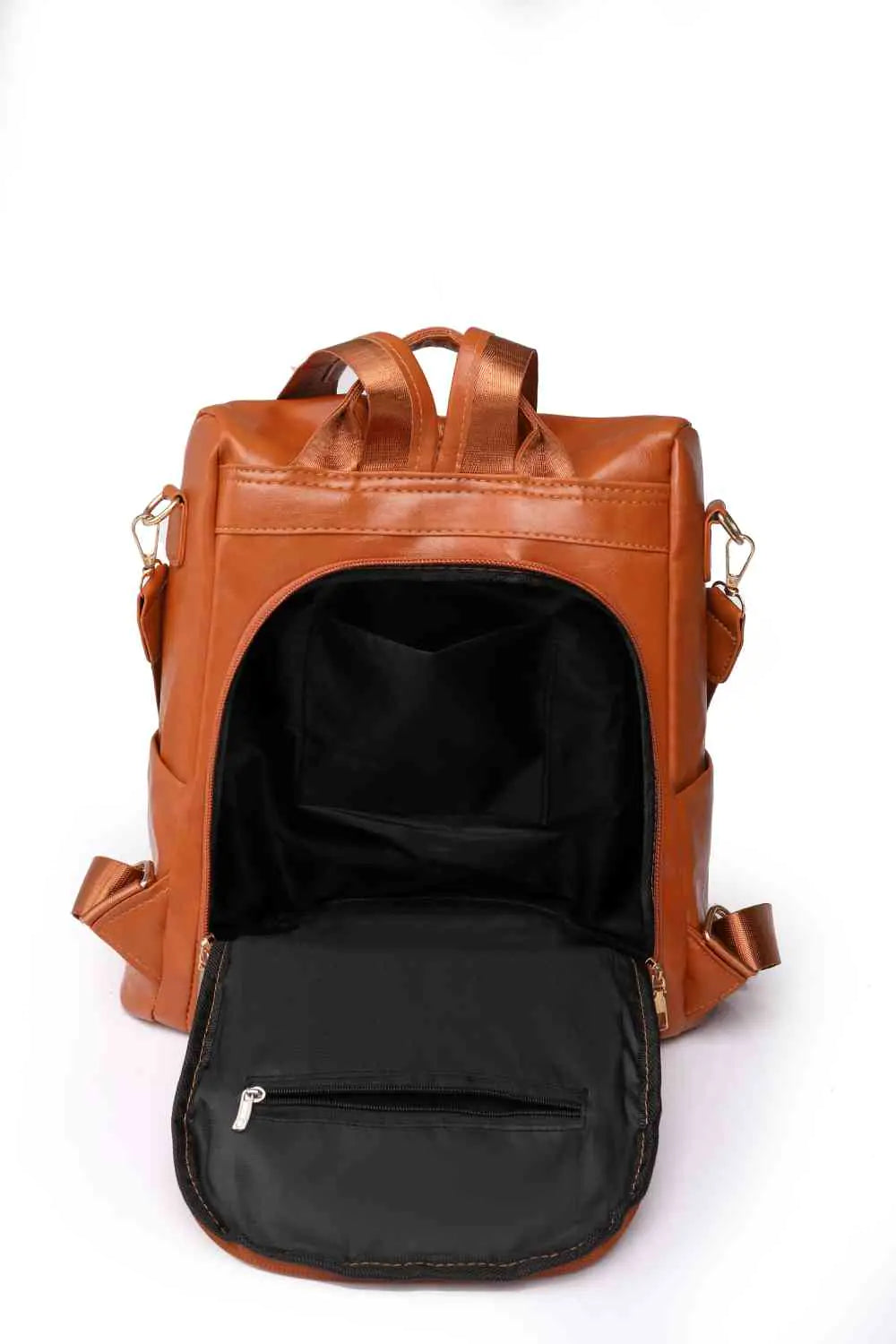 Marcy Zipper Pocket Backpack showcasing an open interior with a zippered pocket and an elegant brown exterior.