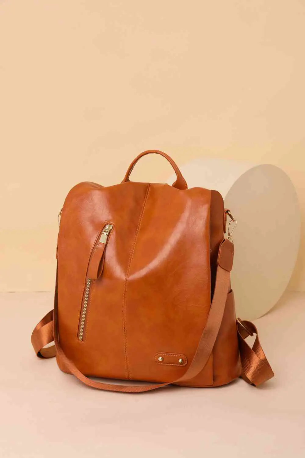 Stylish Marcy Zipper Pocket Backpack in brown leather with zipper pockets and durable design.