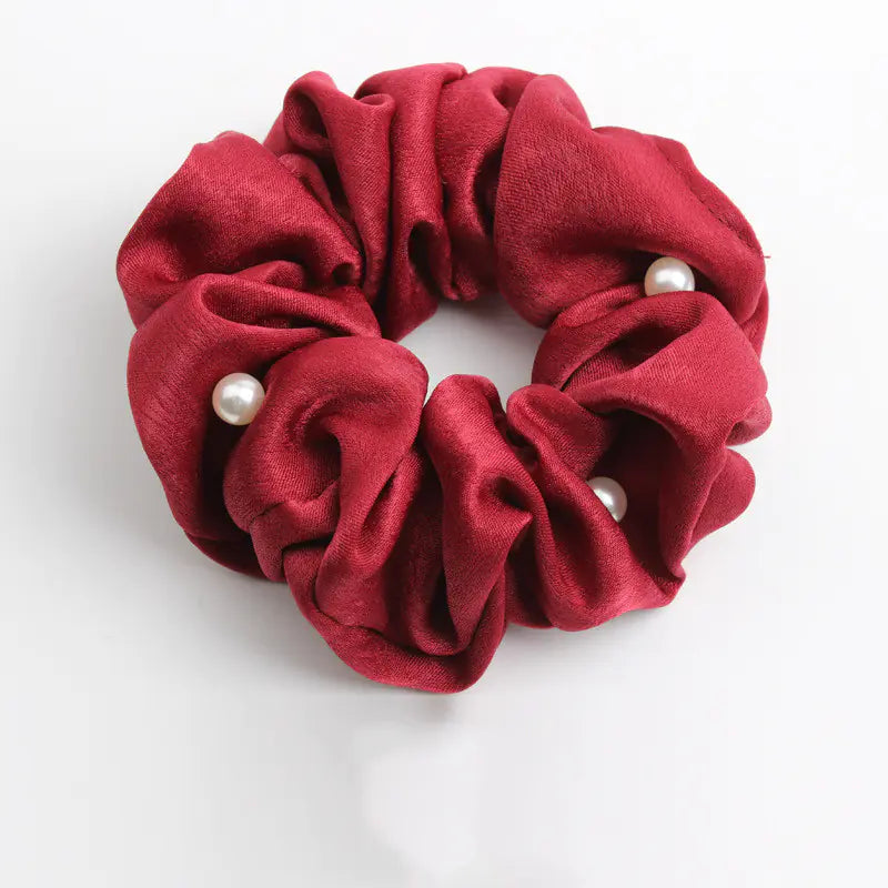 cloth hair accessories in red satin with pearls, stylish and functional hair accessory.